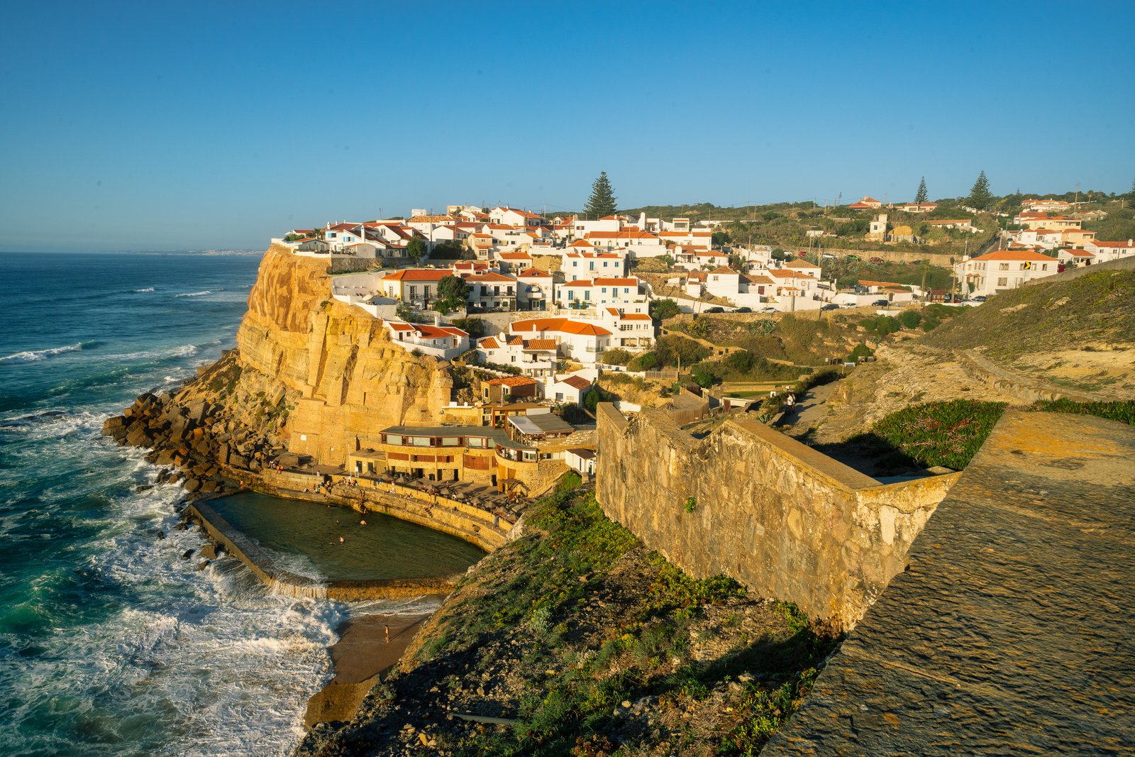 Azenhas do Mar cliffs and village in late light
